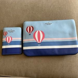 Kate Spade wristlet with passport holder.